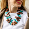 handmade turquoise howlite, wood, and amethyst necklace katie bartels